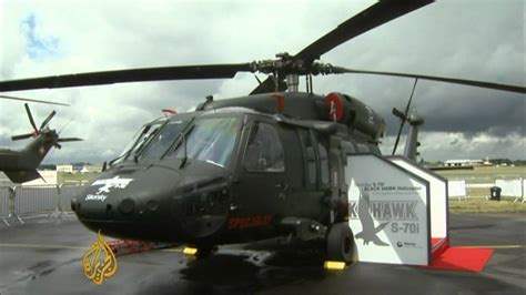 Defense budgets tight at Farnborough airshow .
